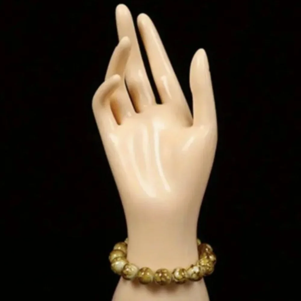 Female hand rings and bracelets display storage, organization color skin 9in h